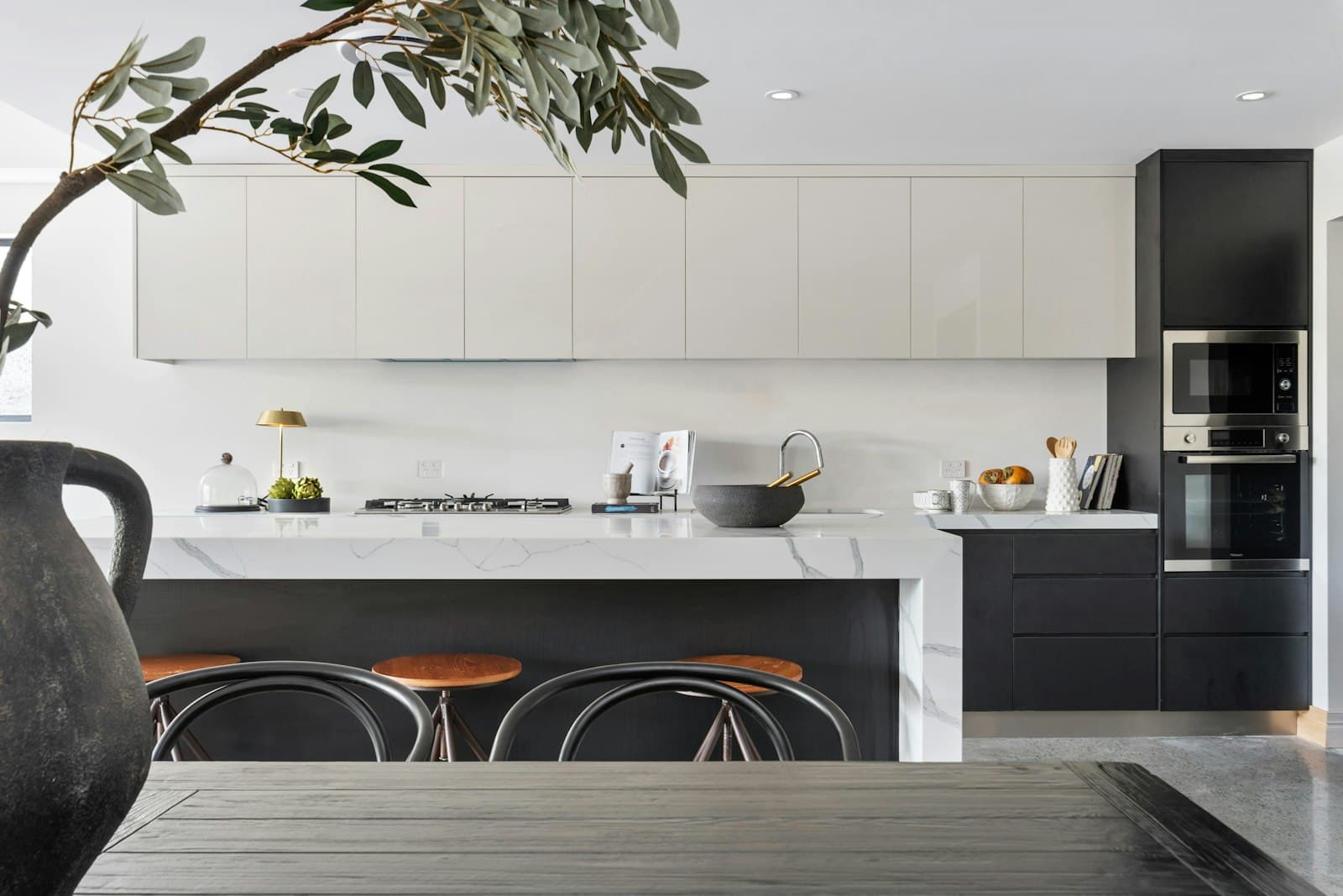 A newly installed kitchen with cabinetry and benchtops
