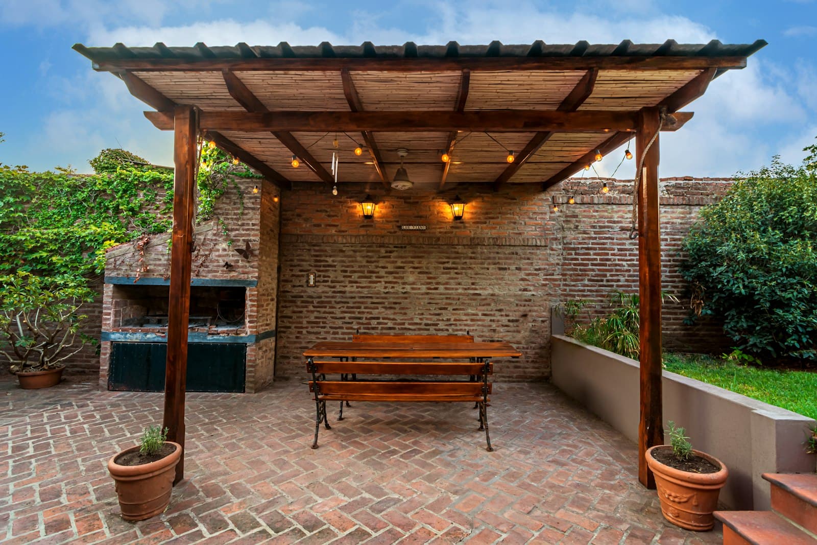 A timber outdoor structure being built in a backyard